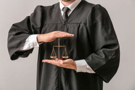 Male judge on light background, closeupの写真素材