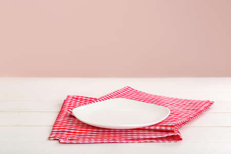 Plate and napkin on tableの写真素材