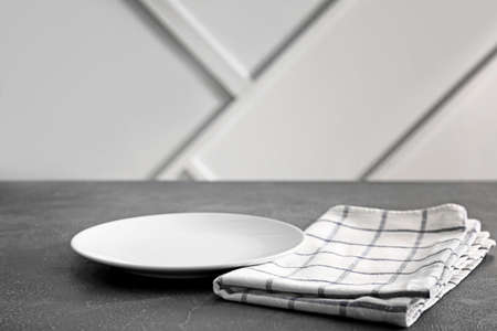 Plate and napkin on tableの写真素材