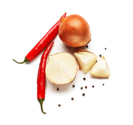 Fresh raw onion and spices on white backgroundの写真素材