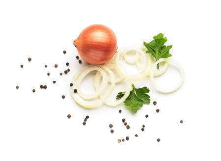 Fresh raw onion and spices on white backgroundの写真素材
