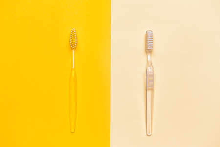 Tooth brushes on color backgroundの写真素材