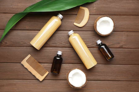 Cosmetics for hair on wooden backgroundの写真素材