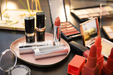 Different cosmetics on table of makeup artistの写真素材