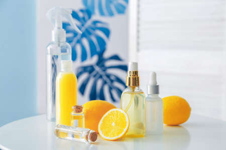 Cosmetics for hair on table in bathroomの写真素材