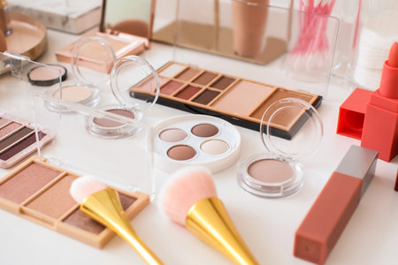 Different cosmetics on table of makeup artistの写真素材