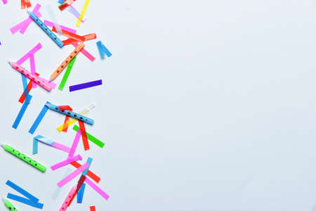 Candles with confetti on white backgroundの写真素材