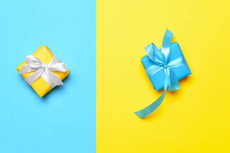 Birthday gifts on color backgroundの写真素材