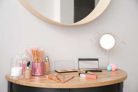 Workplace of makeup artist in interior of room