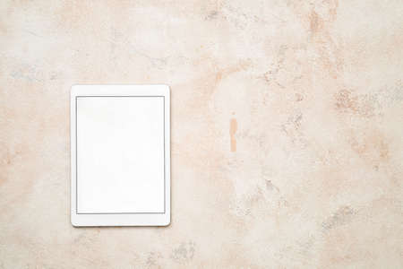 Modern tablet computer on gray backgroundの写真素材