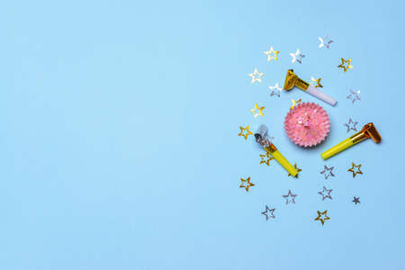 Birthday cake and decor on color backgroundの写真素材