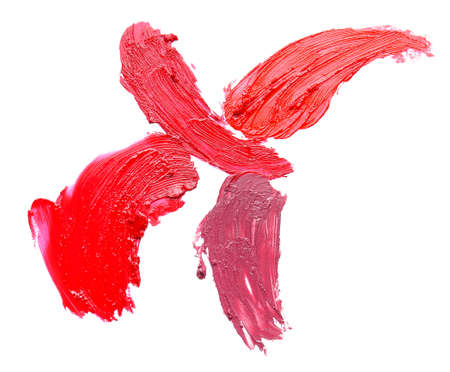Strokes of bright lipsticks on white backgroundの写真素材