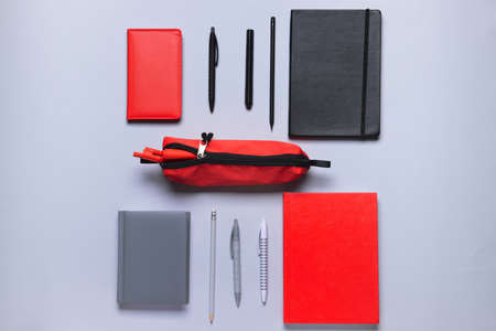Pencil bag with stationery on gray backgroundの写真素材