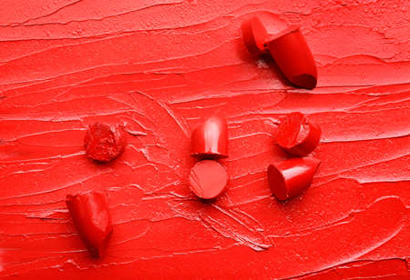Bright red lipstick with pieces, closeupの写真素材