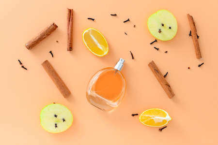 Beautiful composition with perfume bottle on color backgroundの写真素材