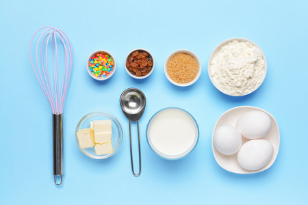 Ingredients for preparing bakery on color backgroundの写真素材