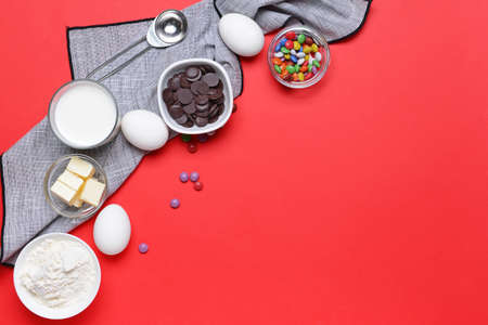 Ingredients for preparing bakery on color backgroundの写真素材