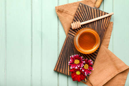Composition with sweet honey on wooden backgroundの写真素材