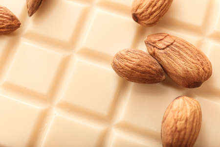 Sweet white chocolate with almond, closeupの写真素材