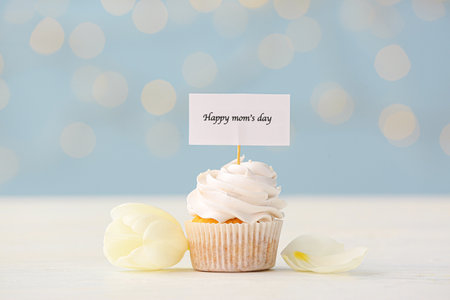 Tasty cupcake for Mother's Day on tableの写真素材