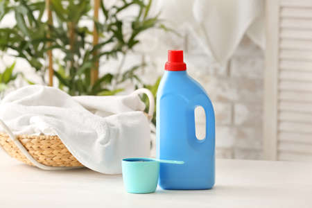 Laundry detergent with basket on tableの写真素材