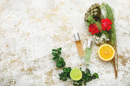 Beautiful composition with perfume bottles on white backgroundの写真素材