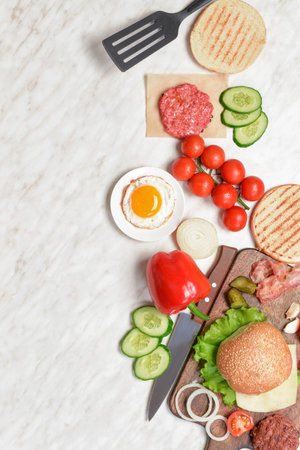 Ingredients for tasty burger on white backgroundの写真素材