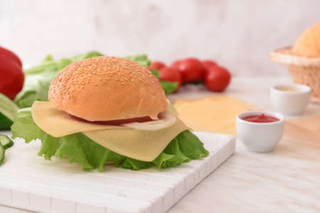 Ingredients for tasty burger on tableの写真素材