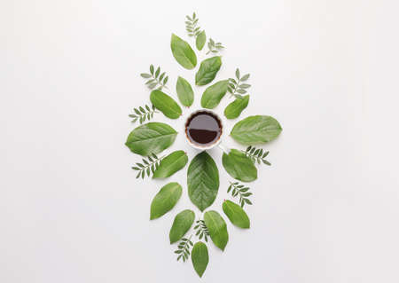 Beautiful composition with cup of coffee on white backgroundの写真素材