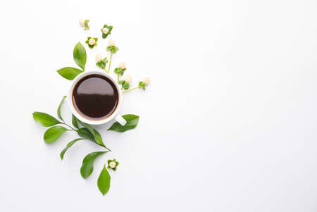 Beautiful composition with cup of coffee on white backgroundの写真素材