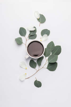 Beautiful composition with cup of coffee on white backgroundの写真素材