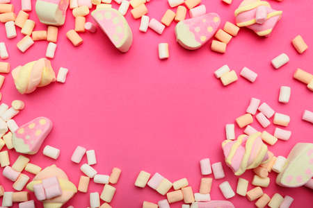 Frame made of sweet marshmallows on color backgroundの写真素材
