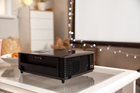 Modern video projector in roomの写真素材