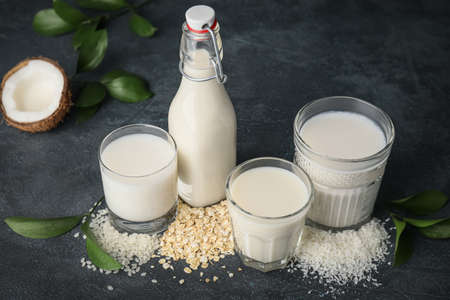 Different milk on dark backgroundの写真素材