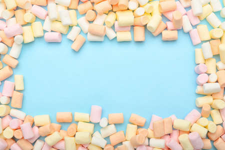 Frame made of marshmallows on color backgroundの写真素材