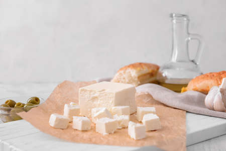 Tasty feta cheese on tableの写真素材