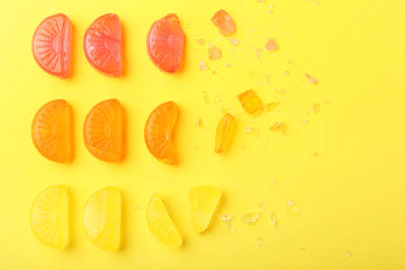 Sweet candies on color backgroundの写真素材