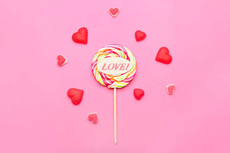 Sweet candies on color backgroundの写真素材