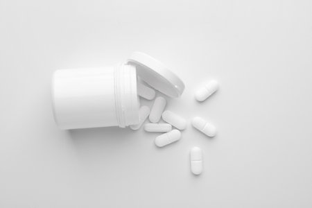 Jar with pills on white backgroundの写真素材