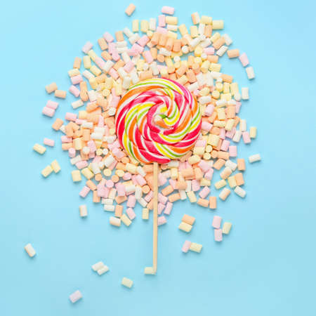 Sweet candies on color backgroundの写真素材