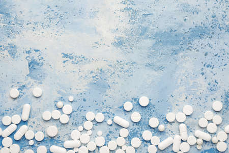 Many pills on color backgroundの写真素材