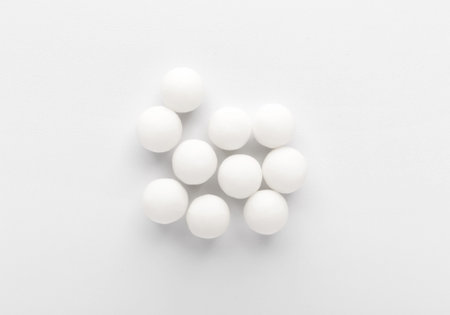 Heap of pills on white backgroundの写真素材