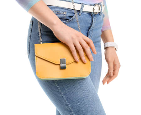 Beautiful woman with stylish bag on white background, closeupの写真素材