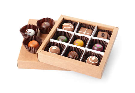 Box with delicious candies on white background