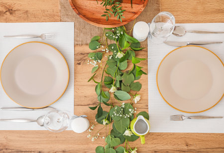Beautiful table setting on wooden backgroundの写真素材