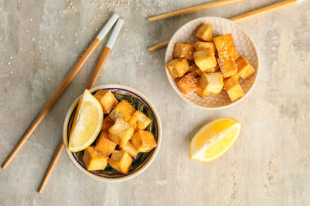 Tasty tofu cheese on gray backgroundの写真素材