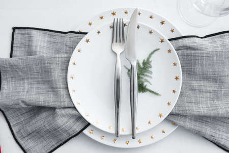 Beautiful table setting on white backgroundの写真素材
