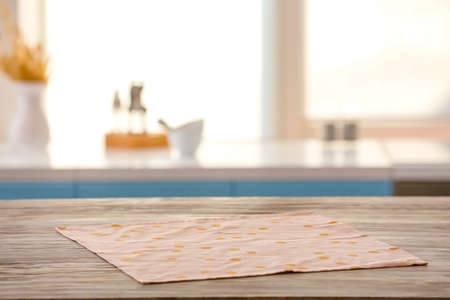 Napkin on table in kitchenの写真素材