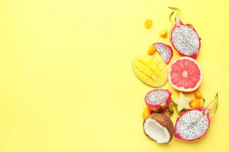 Tasty exotic fruits on color backgroundの写真素材