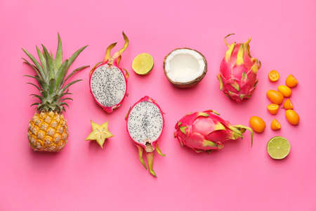 Tasty exotic fruits on color backgroundの写真素材